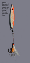 Load image into Gallery viewer, AJ_158-Swimstik-Jigging-Lure-1.25oz-Orange-and-White-Glow-with-Dressed-Tail
